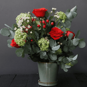 red and green natural design in a ceramic pot