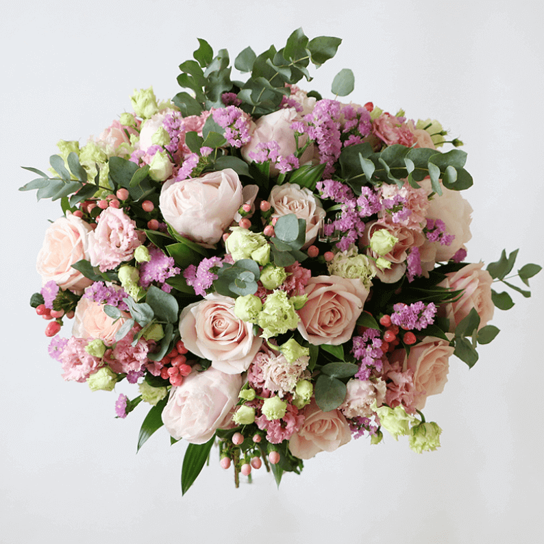 light pink roses with spray roses, eustoma and eucalyptus