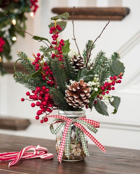 Christmas mason jar filled with foliage