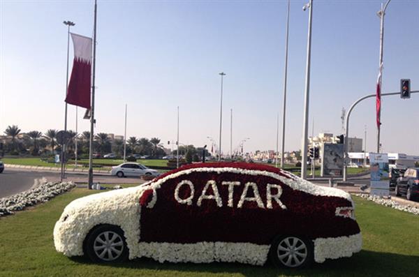 Car covered in flowers for national day