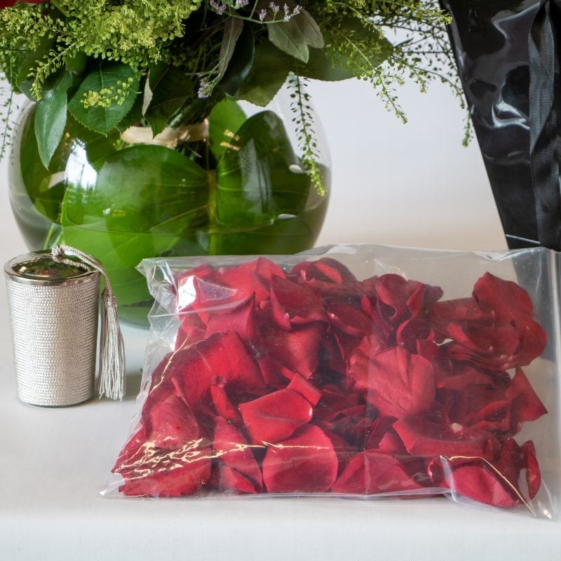 Close up of petals and candle