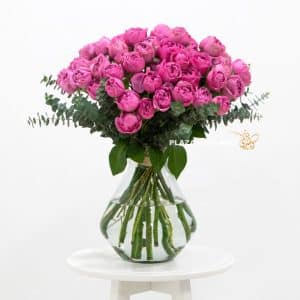 Misty bubble spray roses in a vase