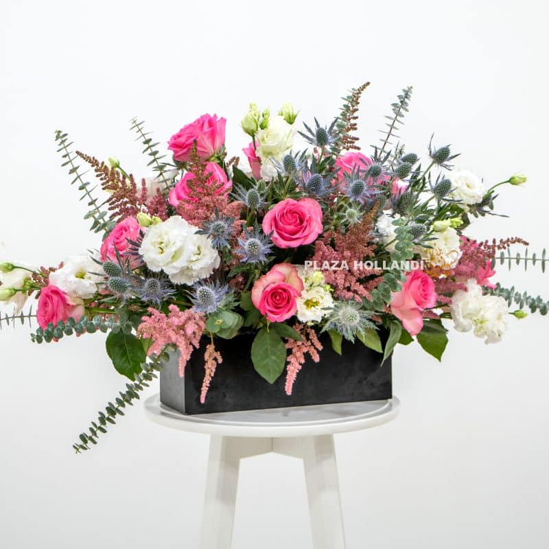 Pink flowers in a wooden box