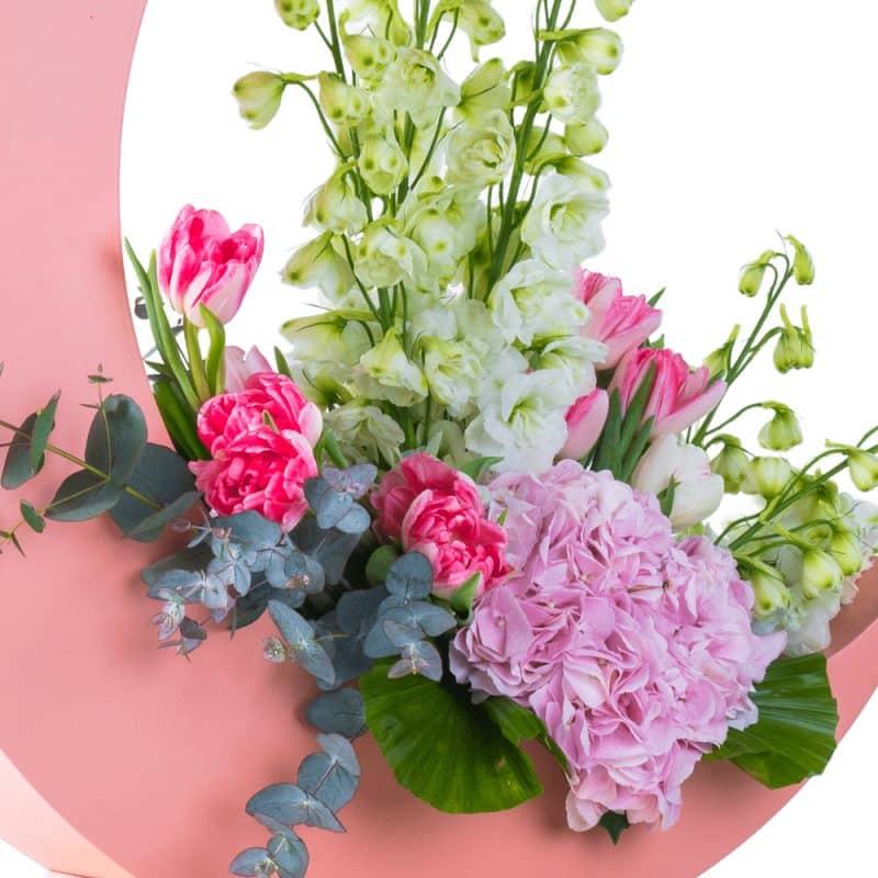 Flower Arrangement in a Pink Half Moon