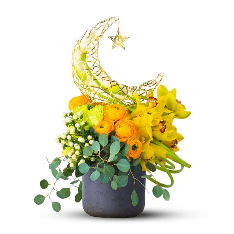 Yellow Flower Arrangement In a Gray Pot