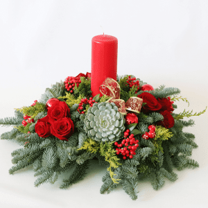 red pillar candle with succulents and red rose