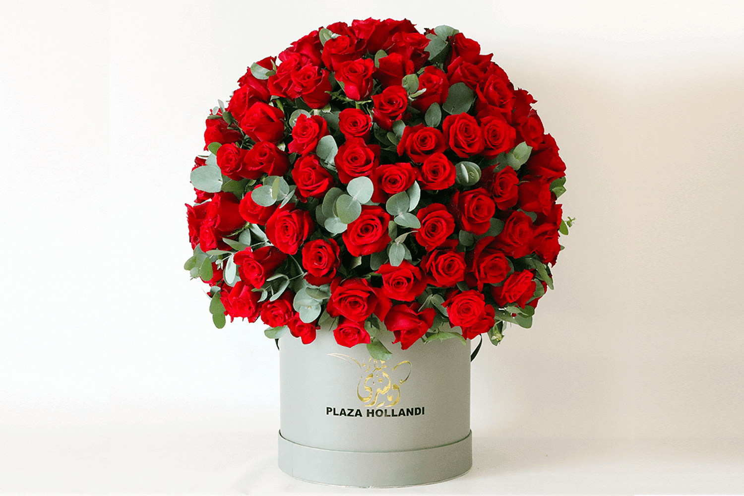 Valentine's Day Red roses and Eucalyptus in a plaza Hollandi hat box