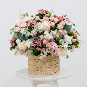 Home 73 Pink and white flower arrangement in a basket