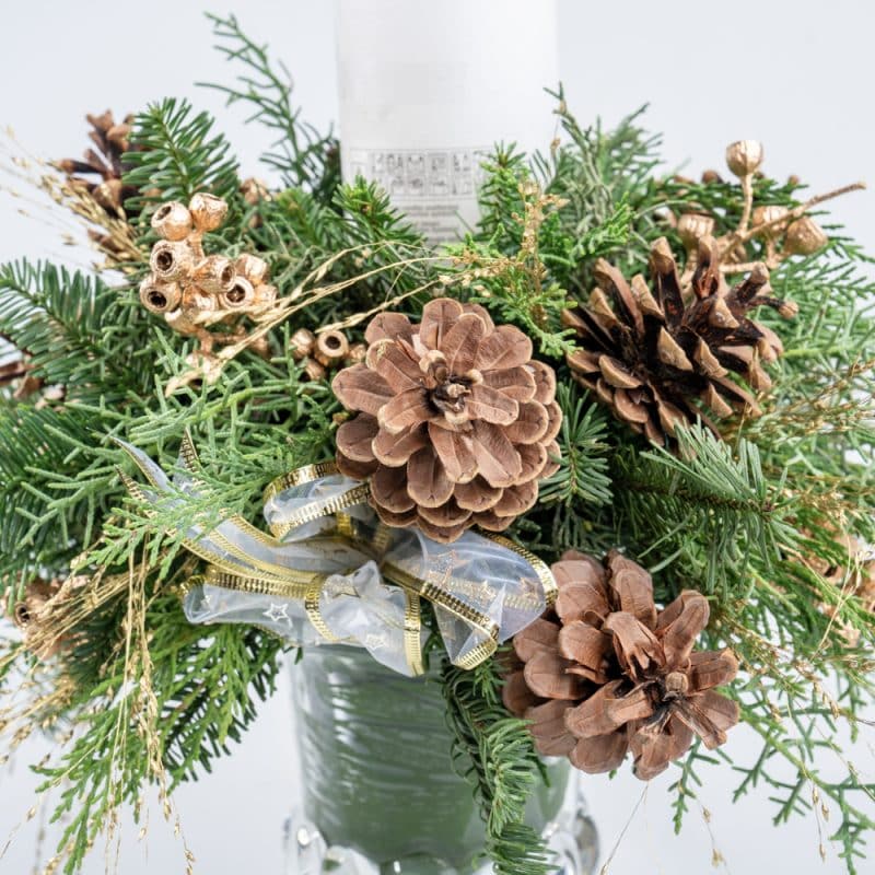 Centerpiece Arrangement with White Candle, Ornaments in Glass Vase