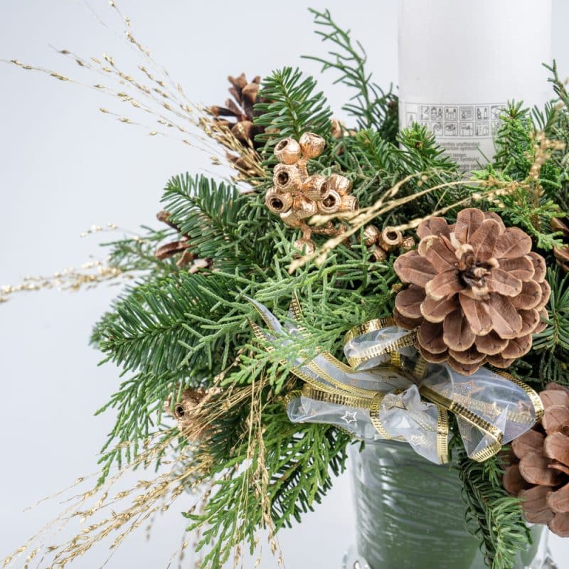 Centerpiece Arrangement with White Candle, Ornaments in Glass Vase