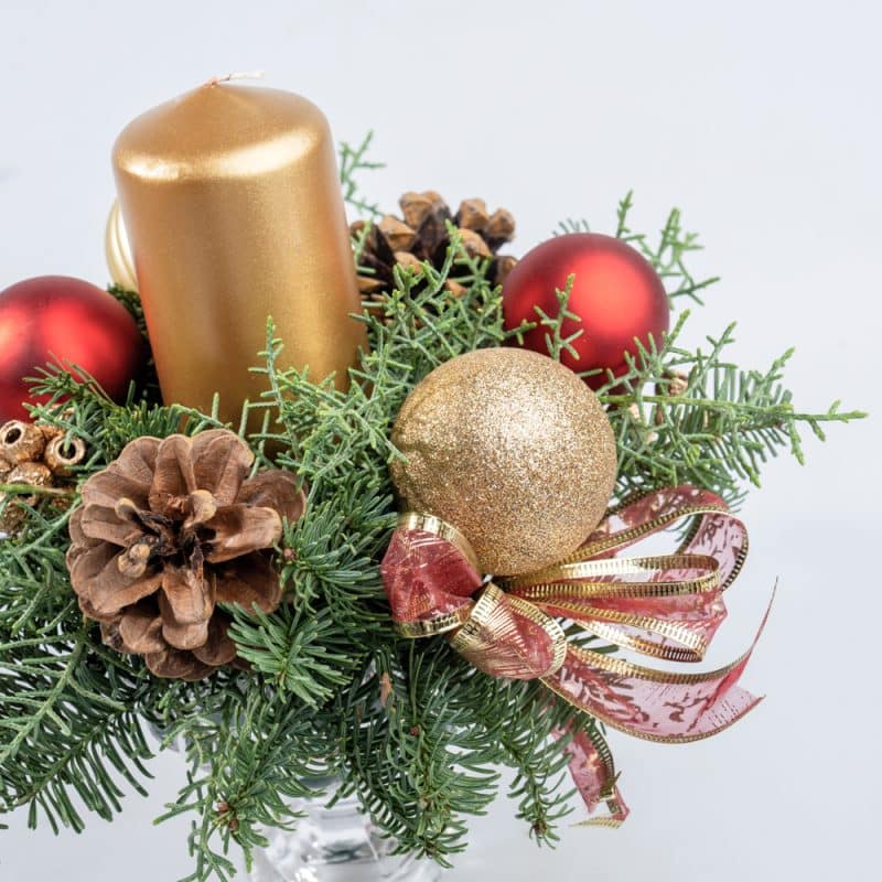 Elegant Centerpiece Arrangement with Candle, Ornaments in Glass Vase